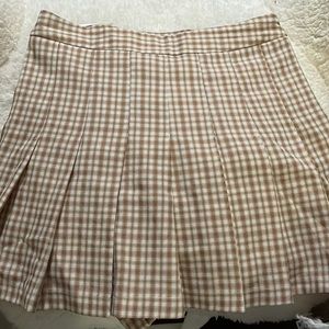 COTTON CANDY LA; XS small skirt; zipper, and shorts included.